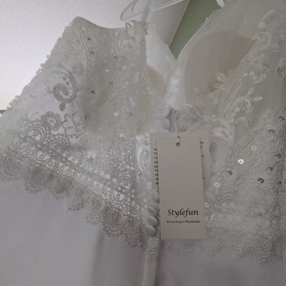Elegant White Lace & Beaded Wedding Gown - Picture 4 of 12